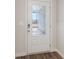 White front door with glass panels and simple design at 3933 Brushy St, Powder Springs, GA 30127