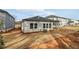 Newly constructed home with covered patio and large backyard at 3933 Brushy St, Powder Springs, GA 30127