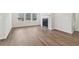 Spacious living room with hardwood floors and a fireplace at 3933 Brushy St, Powder Springs, GA 30127