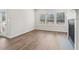 Bright living room with hardwood floors, fireplace, and lots of windows at 3933 Brushy St, Powder Springs, GA 30127