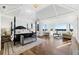 Expansive main bedroom with hardwood floors, sitting area, and stunning views at 8380 Sentinae Chase Dr, Roswell, GA 30076