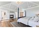Main bedroom features trey ceiling, fireplace, and ensuite bathroom at 8380 Sentinae Chase Dr, Roswell, GA 30076
