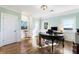 Bright home office with natural light and a serene view of the surrounding landscape at 8380 Sentinae Chase Dr, Roswell, GA 30076