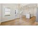 Bright dining area with hardwood floors and access to the kitchen at 4755 Marjorie Dr, Cumming, GA 30041