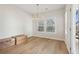 Bright dining room featuring hardwood floors and access to backyard at 4755 Marjorie Dr, Cumming, GA 30041