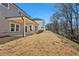 Two story house with covered patio and backyard at 4755 Marjorie Dr, Cumming, GA 30041