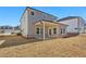 Two story house with covered patio and backyard at 4755 Marjorie Dr, Cumming, GA 30041