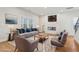 Virtually staged living room with fireplace and hardwood floors at 4755 Marjorie Dr, Cumming, GA 30041