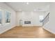 Spacious living room with hardwood floors and a fireplace at 4755 Marjorie Dr, Cumming, GA 30041