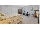 Cozy bedroom with large closets, neutral walls, carpet and an exercise machine at 1250 Olympic Dr, Oxford, GA 30054