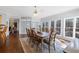 Dining area with hardwood floors, natural light, and view to the outdoor landscape at 1250 Olympic Dr, Oxford, GA 30054