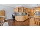 Open kitchen area featuring custom cabinetry, granite counters, and breakfast nook at 1250 Olympic Dr, Oxford, GA 30054