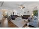 Spacious living room showcasing hardwood floors, leather couches, and decorative lamps at 1250 Olympic Dr, Oxford, GA 30054