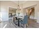 The dining room has hardwood floors, wainscotting and a staircase leading to the second floor at 30 Pinewood Dr, Covington, GA 30014