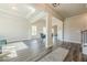 Open-concept living room with hardwood floors and recessed lighting, perfect for entertaining guests at 30 Pinewood Dr, Covington, GA 30014