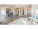 Expansive living space featuring hardwood floors, open layout, and access to multiple rooms at 30 Pinewood Dr, Covington, GA 30014