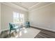 Inviting sitting room with hardwood floors, offering a relaxing space for conversation at 30 Pinewood Dr, Covington, GA 30014