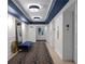 Elegant building hallway features custom lighting, elevator access, and unit entry, creating a welcoming ambiance at 199 14Th St # 3003, Atlanta, GA 30309