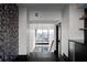 Stylish hallway leading to staircase with unique decorative wall and modern lighting at 199 14Th St # 3003, Atlanta, GA 30309
