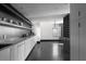 Modern kitchen featuring sleek countertops and cabinetry, accented by dark hardwood floors at 199 14Th St # 3003, Atlanta, GA 30309