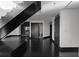 Spacious living room with an entertainment center, dark hardwood floors, and modern decor at 199 14Th St # 3003, Atlanta, GA 30309