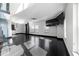 Bright open-concept living area offers a modern design, city views, custom staircase, and entertainment space at 199 14Th St # 3003, Atlanta, GA 30309