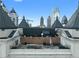 Chic rooftop terrace offering city views and outdoor seating area at 199 14Th St # 3003, Atlanta, GA 30309
