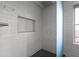 Tiled shower with a built-in shelf and modern fixtures at 199 14Th St # 3003, Atlanta, GA 30309