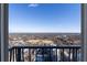 Scenic balcony view overlooking the city and trees on a sunny day at 199 14Th St # 3003, Atlanta, GA 30309