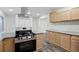 Updated kitchen with granite countertops and stainless steel appliances at 4051 Glenda Dr, College Park, GA 30337