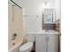 Bathroom with white cabinets and tile at 1077 Mainstreet Valley Dr, Stone Mountain, GA 30088