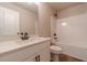 Clean bathroom with white vanity and shower/tub combo at 1892 Alcovy Station Rd, Covington, GA 30014