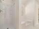 Bright bathroom featuring a shower stall and a soaking tub with tile surround and a window at 6849 Fireside Ln, Atlanta, GA 30349