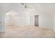 Large bedroom boasts neutral carpet, bright white walls, and a ceiling fan for added comfort at 6849 Fireside Ln, Atlanta, GA 30349