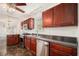 Updated kitchen with stainless steel appliances, sleek countertops, and ample cabinet space for storage at 6849 Fireside Ln, Atlanta, GA 30349