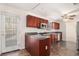 Well-equipped kitchen with stainless steel appliances, dark countertops, and a view to the outdoor area at 6849 Fireside Ln, Atlanta, GA 30349