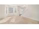 Bright living room with large windows offering natural light and a view from the main floor at 6849 Fireside Ln, Atlanta, GA 30349