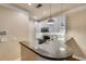 Modern kitchen with granite countertops and white cabinets at 216 Semel Nw Dr # 376, Atlanta, GA 30309