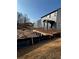 New home construction with a gray exterior and a backyard prepped for new sod at 126 Henley St, Canton, GA 30114