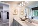 Bathroom with double vanity and bright, natural light at 126 Henley St, Canton, GA 30114