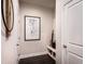 Clean and modern entryway featuring a coat rack, mirror, and neutral decor at 126 Henley St, Canton, GA 30114