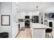 Modern kitchen with white cabinets and granite countertops at 3465 Callie Still Rd, Lawrenceville, GA 30045