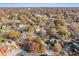 Aerial view of neighborhood with autumn foliage and tree cover at 1112 Delaware Se Ave, Atlanta, GA 30316