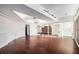 Open basement with hardwood floors and exposed brick wall at 1112 Delaware Se Ave, Atlanta, GA 30316