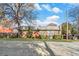 Brick building with large windows, metal roof, and landscaping at 1112 Delaware Se Ave, Atlanta, GA 30316