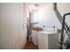 Basement laundry room with washer, dryer, and pegboard wall at 1112 Delaware Se Ave, Atlanta, GA 30316