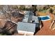 House with gray roof and a pool in the backyard at 5023 Vernon Oaks Dr, Atlanta, GA 30338