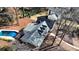 House with gray roof, backyard, and pool at 5023 Vernon Oaks Dr, Atlanta, GA 30338