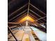 Spacious attic with plywood flooring and wooden beams at 5023 Vernon Oaks Dr, Atlanta, GA 30338