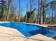 Inviting in-ground pool, perfect for relaxation at 5023 Vernon Oaks Dr, Atlanta, GA 30338